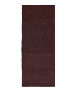 Stille Tufted Runner in Dark Pecan, seen from above