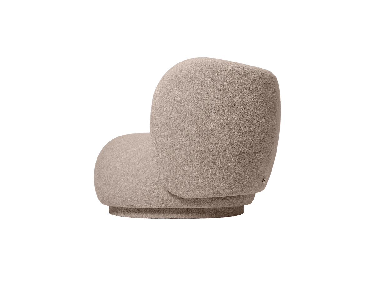 Side view of the armrest module in Soft Bouclé natural, rounded seat and back