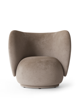 Rico Lounge Chair in beige faded velvet with curved wraparound back