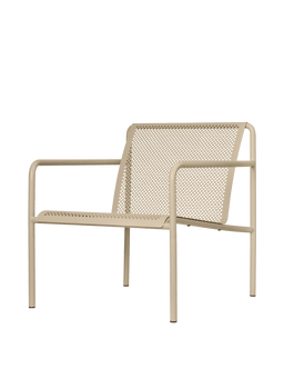 Dapple Lounge Chair with Arms in cashmere with perforated seat and back, seen at an angle