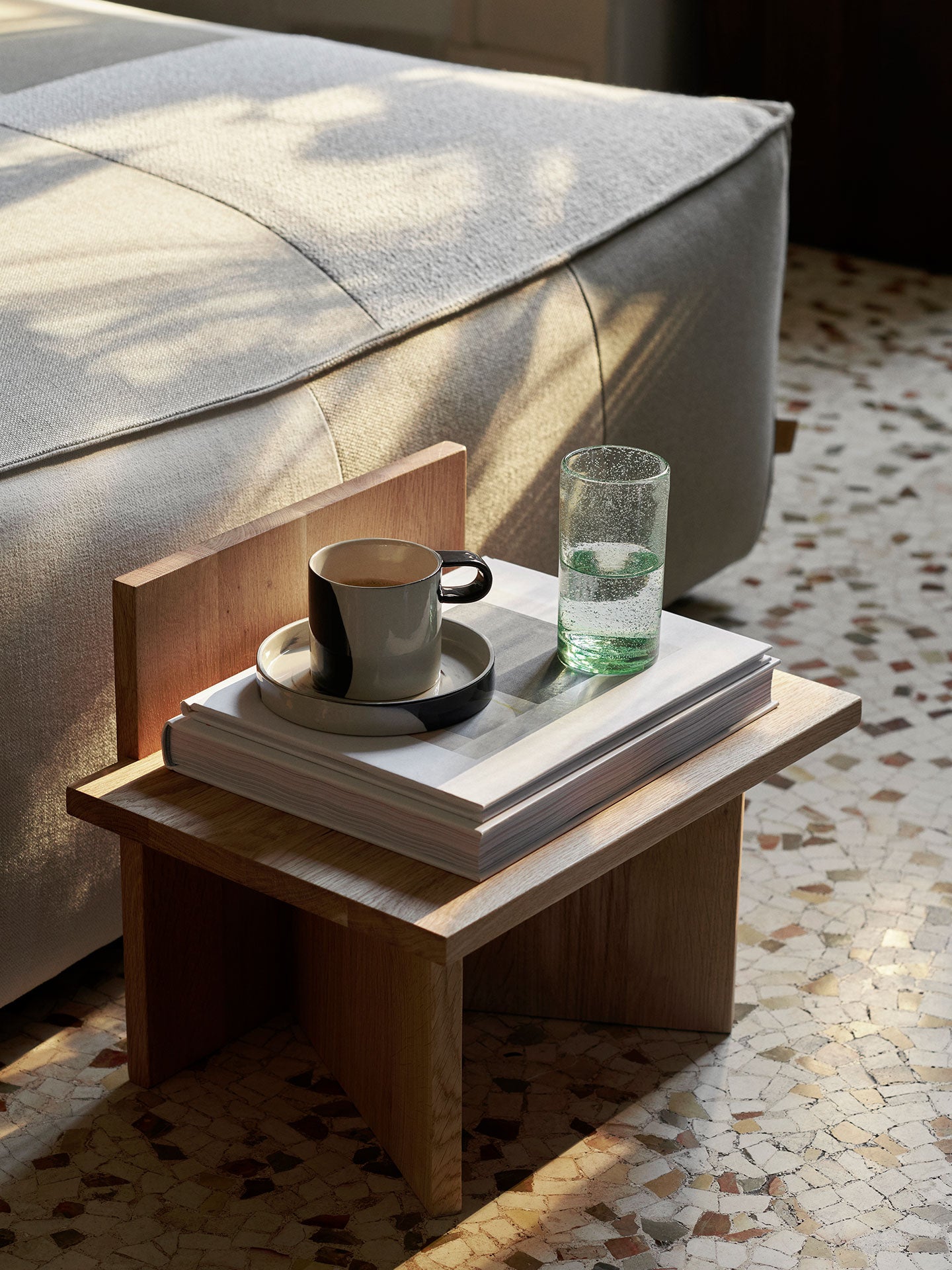 Oblique stool in natural oak | Available in a choice of shades
